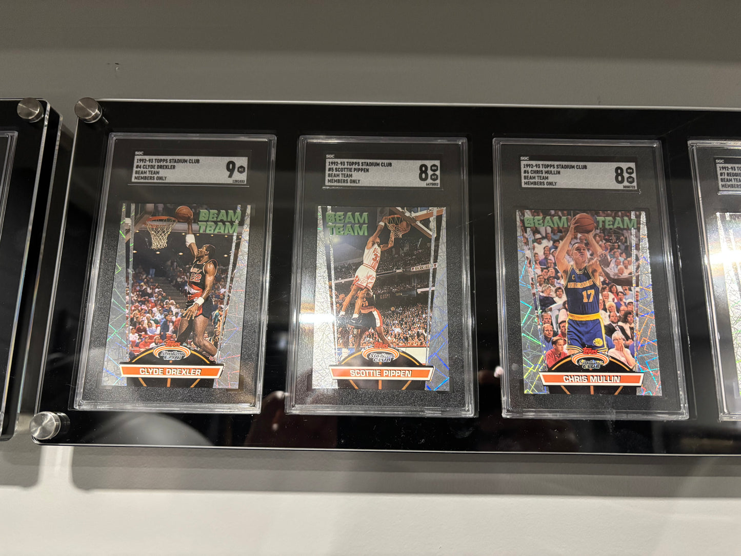 Items included
92/93 members only tops stadium club complete set with beam team graded by SGC

1987 NBA fleer sticker set grated PSA 8

1988 NBA fleer binder set with three Jordans included