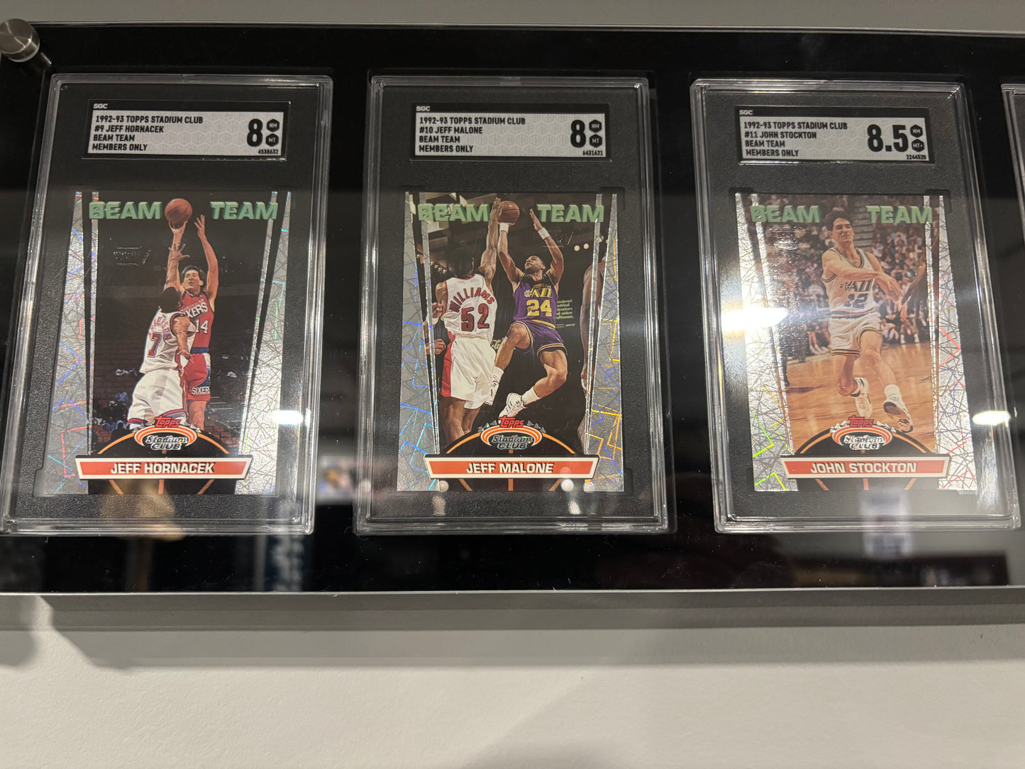 Items included
92/93 members only tops stadium club complete set with beam team graded by SGC

1987 NBA fleer sticker set grated PSA 8

1988 NBA fleer binder set with three Jordans included