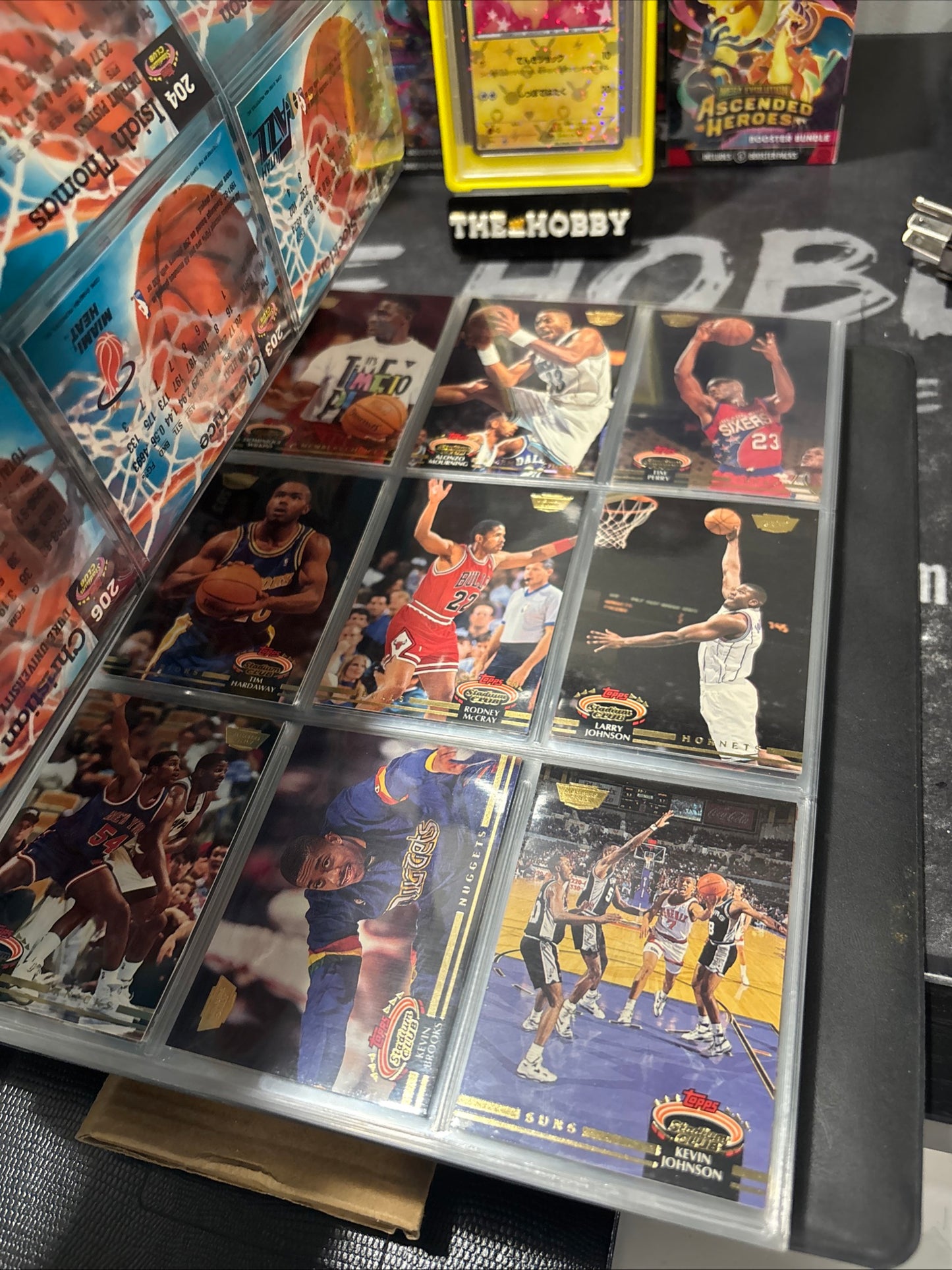 Items included
92/93 members only tops stadium club complete set with beam team graded by SGC

1987 NBA fleer sticker set grated PSA 8

1988 NBA fleer binder set with three Jordans included